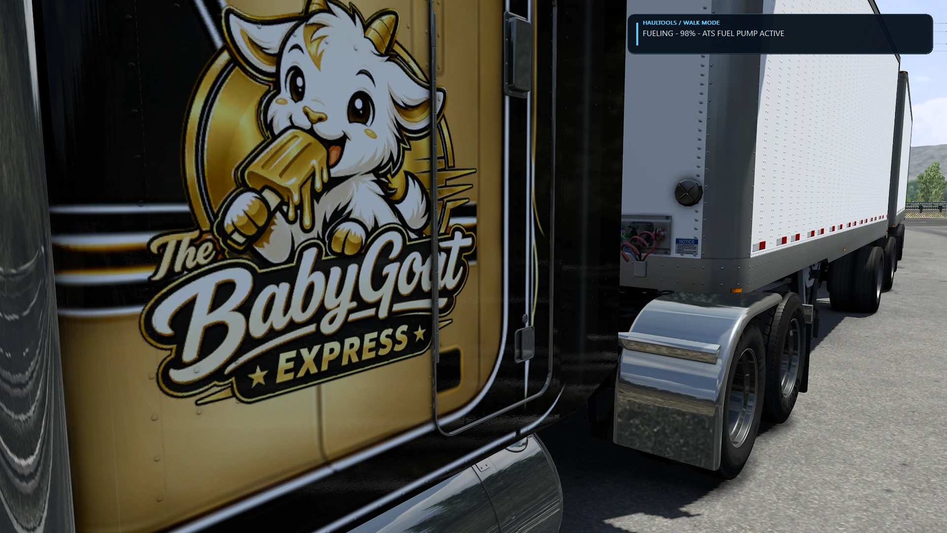 In-game manual refueling prompt shown beside the truck and trailer.