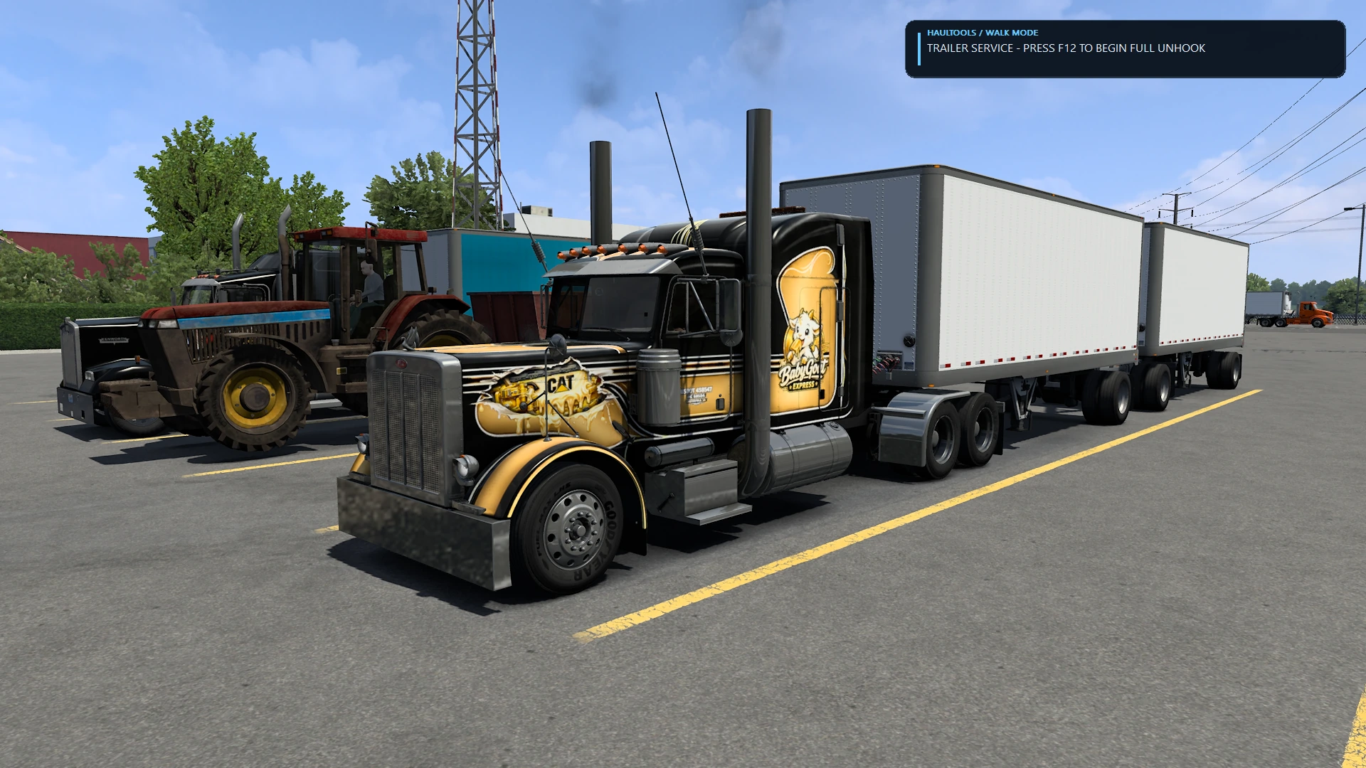 Truck and trailer parked with the HaulTools prompt to begin the full outside unhook workflow.